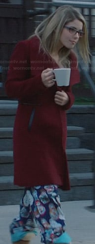 Felicity’s nesting doll pajama pants and red leather-trimmed coat on Arrow
