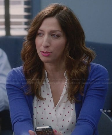 Gina’s white printed v-neck blouse on Brooklyn Nine-Nine