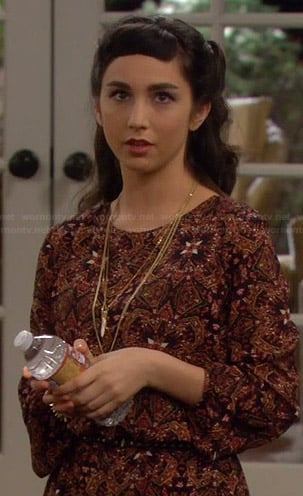 Mandy’s orange printed romper on Last Man Standing