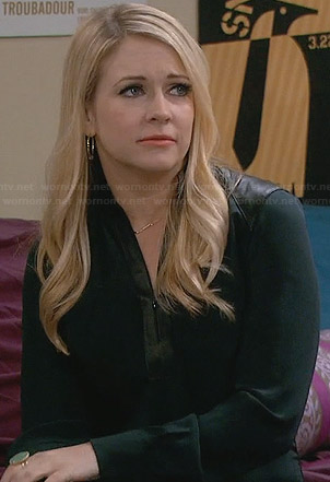 Mel’s green blouse with leather shoulders and zip front on Melissa and Joey