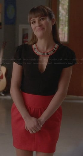 Rachel’s black embroidered keyhole top and red skirt on Glee