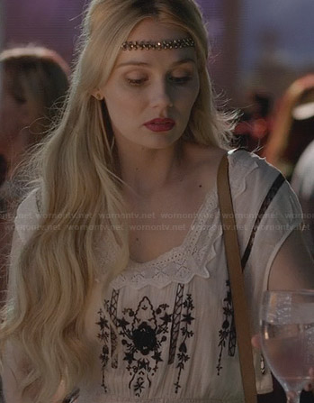 Scarlett’s white dress with black embroidery on Nashville