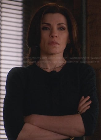 Alicia’s navy tweed jacket with black trim on The Good Wife