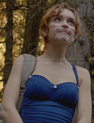 Emma’s blue one-piece swimsuit with flower embellishments on Bates Motel