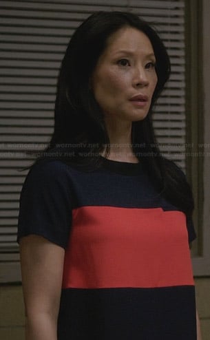 Joan’s navy blue and orange colorblock dress on Elementary