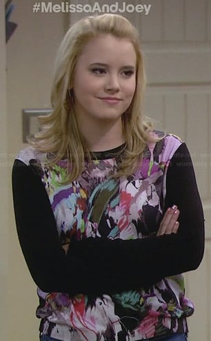 Lennox’s black printed front sweater on Melissa and Joey