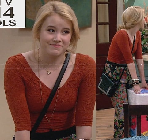 Lennox’s orange lace top and floral pants on Melissa and Joey