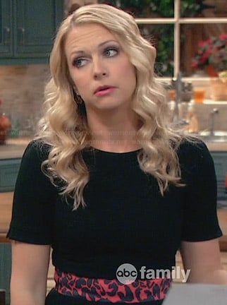 Mel’s black short sleeved dress with red leopard print waist on Melissa and Joey