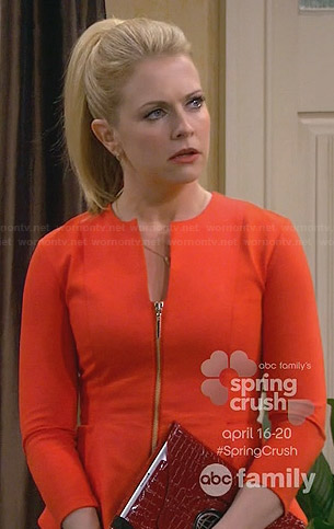 Mel’s orange zip-front peplum dress on Melissa and Joey