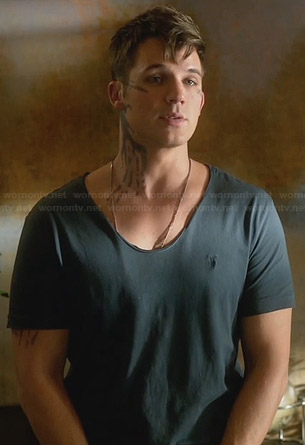 Roman’s grey t-shirt with emblem on Star-Crossed