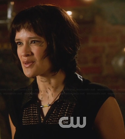 Sophia’s black mesh top with leather collar on Star-Crossed