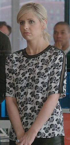 Sydney’s black and white printed top with mesh inserts on The Crazy Ones