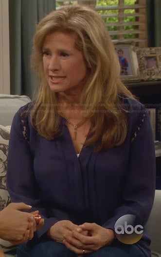 Vanessa’s blue pleated front blouse with lace detail on Last Man Standing
