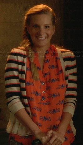 Brittany’s orange octopus print top and striped cardigan on Glee