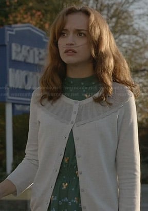 Emma’s green and blue dress with sequins and white cardigan on Bates Motel