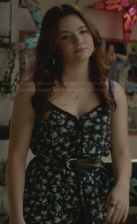 Karma’s navy floral top with black piping on Faking It