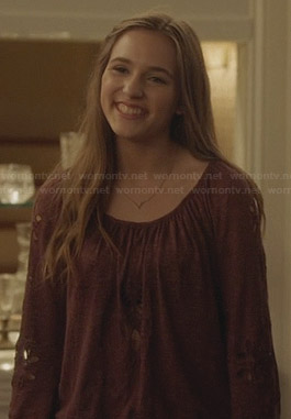 Maddie’s burgundy cutout peasant top on Nashville