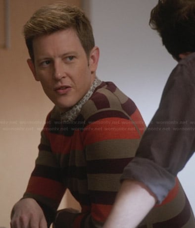 Nolan’s beige, purple, and orange striped sweater on Revenge