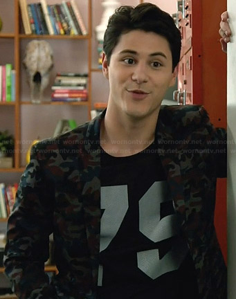 Shane’s camo blazer and “79” tee on Faking It