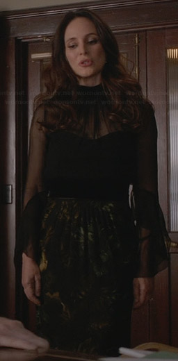 WornOnTV: Victoria's sheer black turtleneck dress with printed