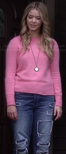 Alison’s pink sweater, ripped boyfriend jeans and clock necklace on Pretty Little Liars
