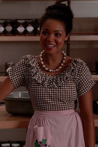 Beth’s brown houndstooth ruffled dress and pearl necklace on Chasing Life