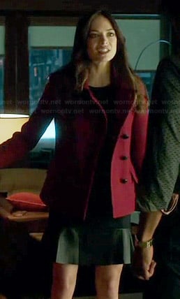 Cat’s black dress with leather trim and red coat on Beauty and the Beast