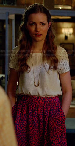 Emma’s white mixed print top and pink floral skirt on Royal Pains