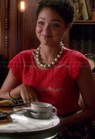 Beth’s red lace top and blue patterned skirt on Chasing Life