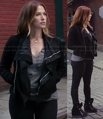 Carrie’s black shawl collar leather jacket and wedged sneakers on Unforgettable