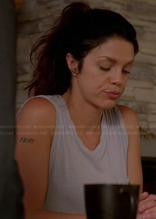 Charlie’s grey twisted neck sleeveless tshirt on Graceland