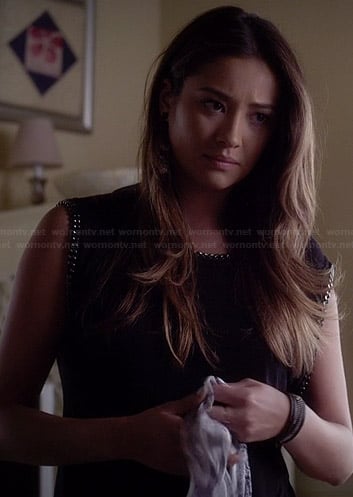 Emily’s black chain trimmed top on Pretty Little Liars