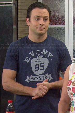 Josh’s blue “E.V. N.Y. 95 Phys Ed” tee on Young and Hungry