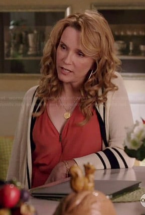 Kathryn’s orange zip front top on Switched at Birth