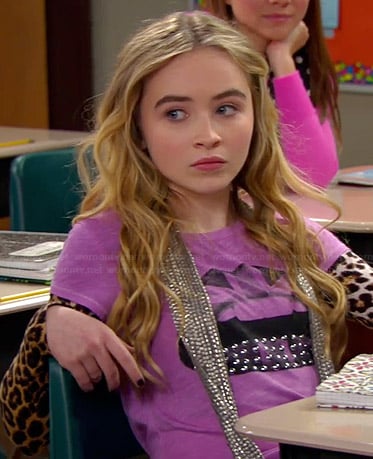 Maya’s purple studded lips graphic tee and long sleeved leopard print top on Girl Meets World