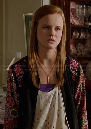 Norrie’s bug print tank top and floral bomber jacket on Under the Dome