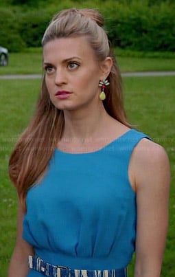 Paige’s blue pleated playsuit and multi colored earrings on Royal Pains