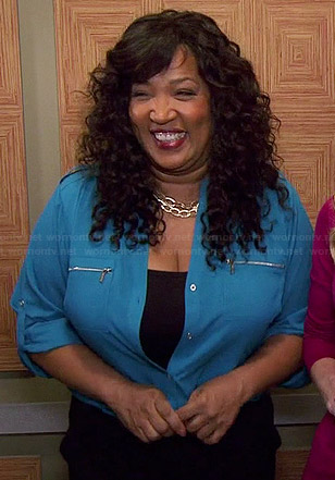 Yolanda’s blue zip pocket shirt on Young and Hungry