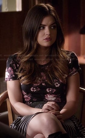 Aria’s black floral top and striped skirt on Pretty Little Liars