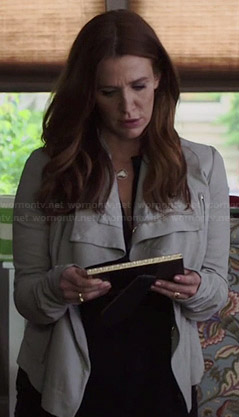 Carrie’s white leather jacket on Unforgettable