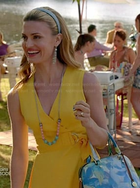 Paige’s yellow belted wrap dress and blue floral bag on Royal Pains