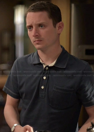 Ryan’s navy blue polo shirt on Wilfred