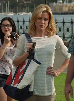 Claire’s white and blue striped sweater on Modern Family