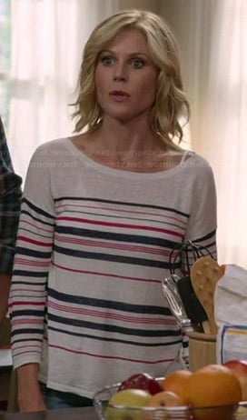 Claire’s pink and navy striped sweater on Modern Family