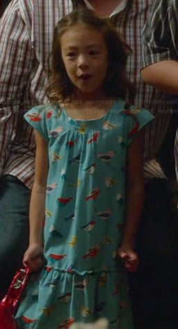 Lily’s blue bird print dress on Modern Family