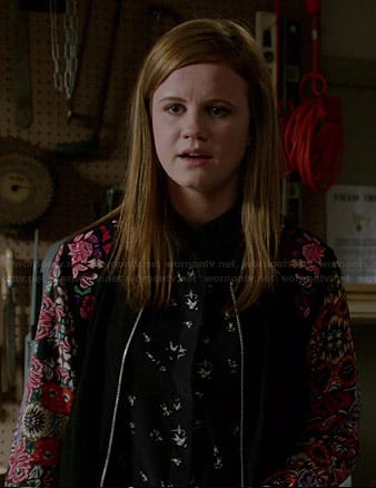 Norrie’s printed top and floral bomber jacket on Under the Dome