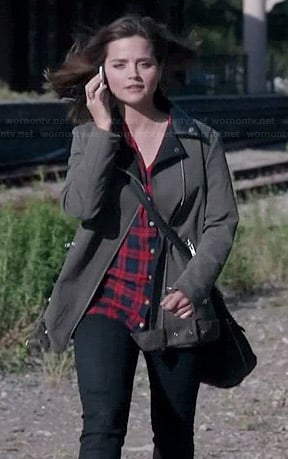 Clara’s army green biker coat with leather lapel, red plaid shirt and high top sneakers on Doctor Who