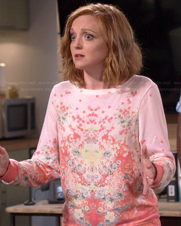Debbie’s peach pink floral sweater on The Millers