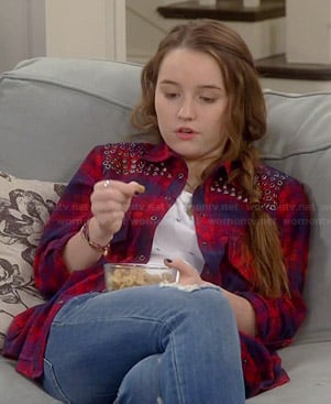 Eve’s red plaid shirt with grommets on Last Man Standing