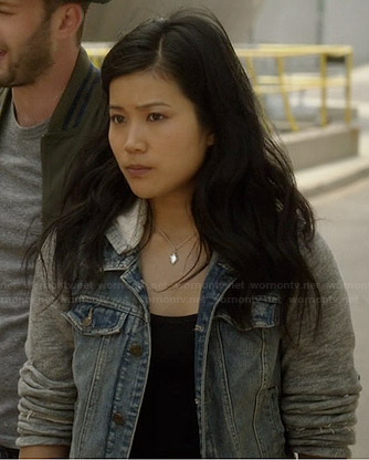 Happy’s denim jacket with grey sleeves on Scorpion